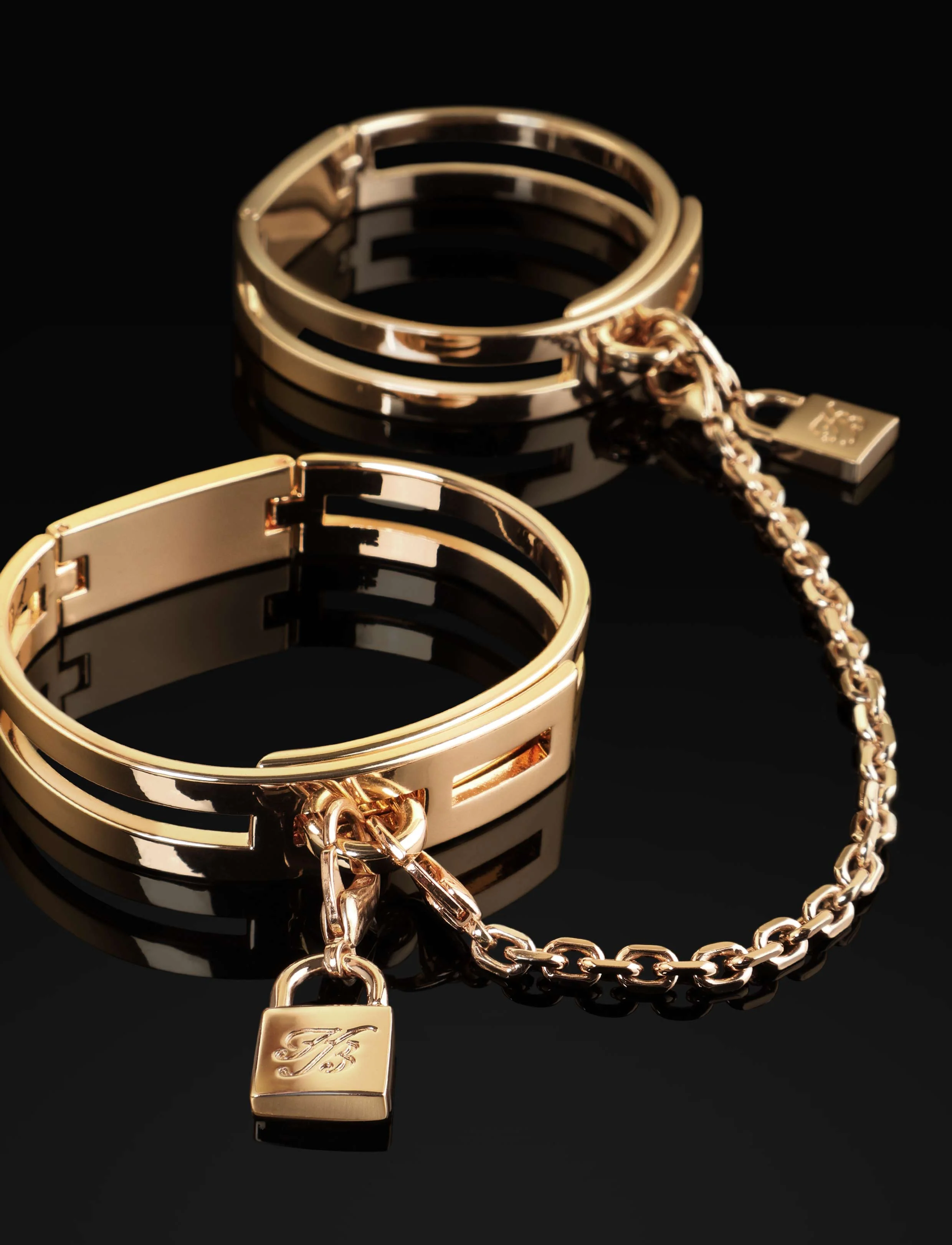 Honey Birdette 金色手镯脚镣，带锁形吊饰