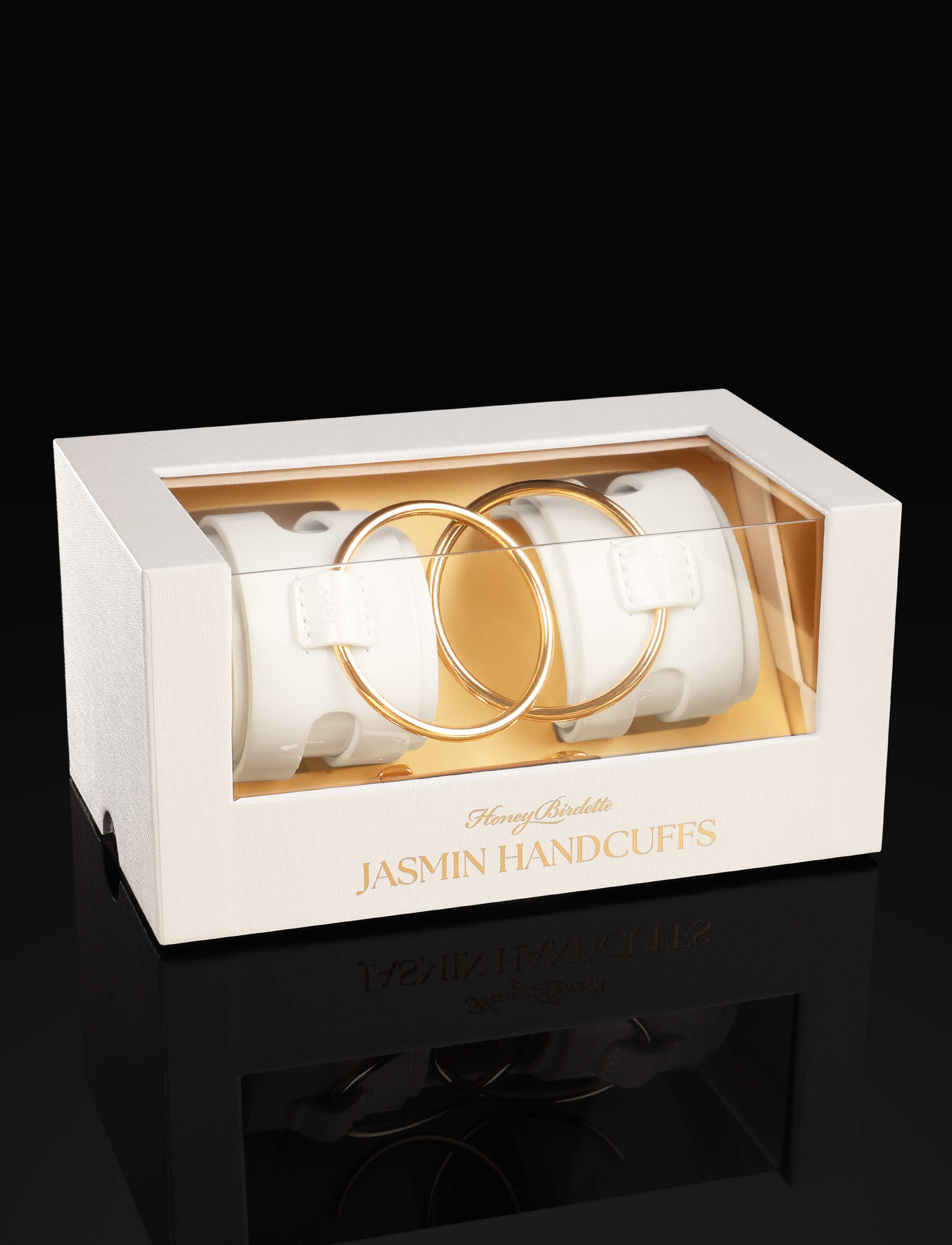 Jasmin White Wrist Cuffs in Patent Leather with Large O Rings